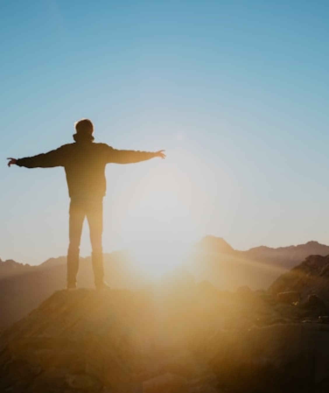Person with arms outstretched